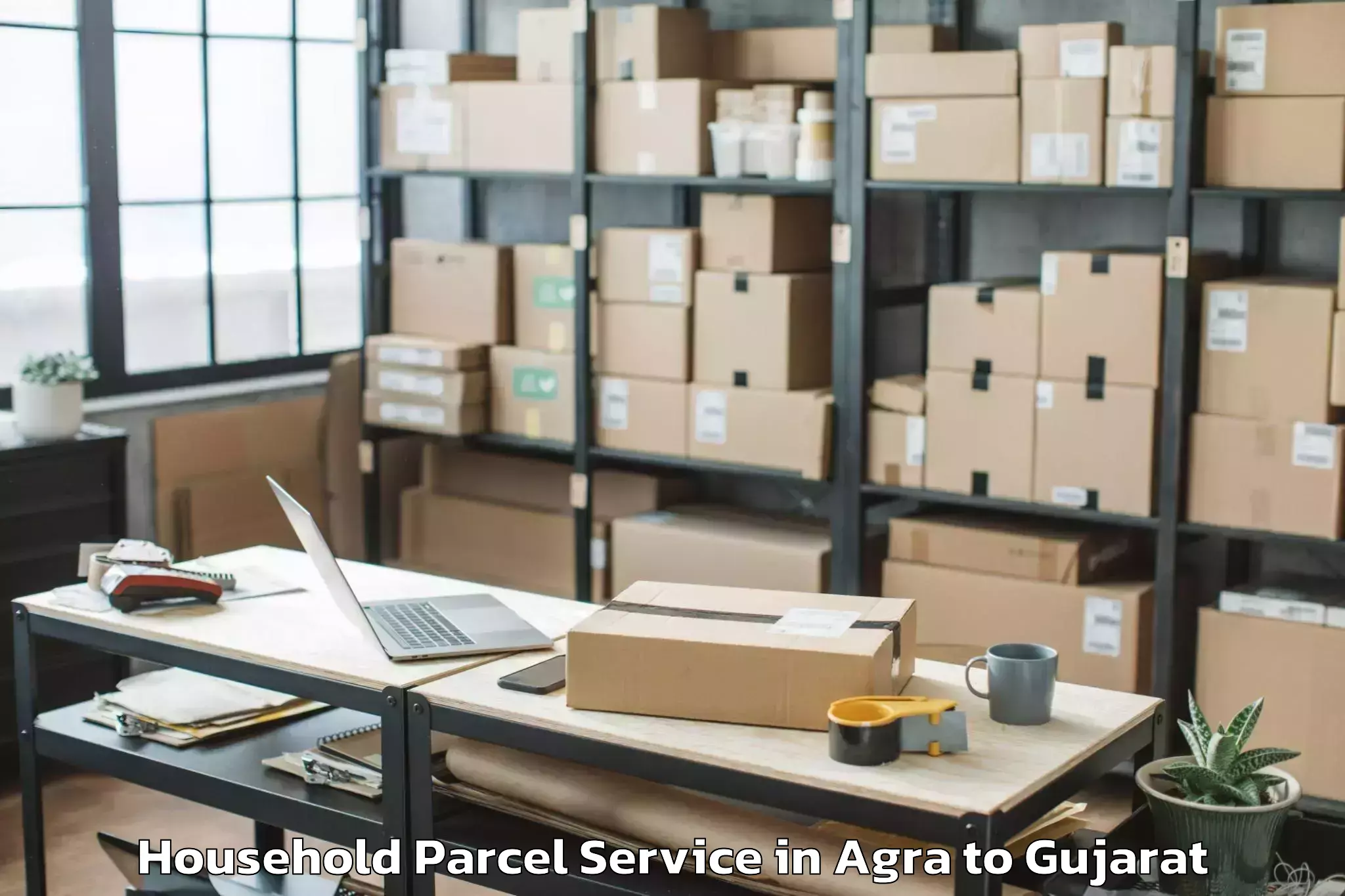 Book Agra to Bhiloda Household Parcel Online